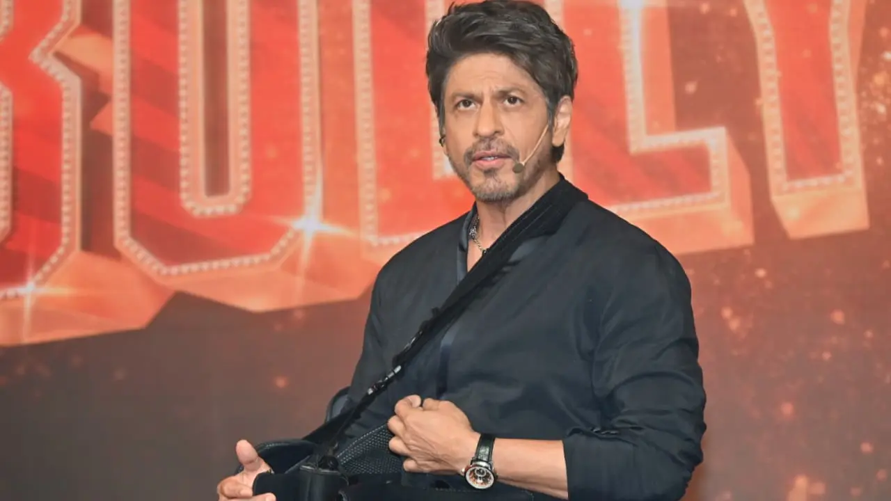 A clip going viral on the internet shows Shah Rukh Khan performing at a wedding in Delhi, when the bride asked him to say 'Zuban Kesari' on stage. The actor gracefully declined it with his witty response. Read full story here
